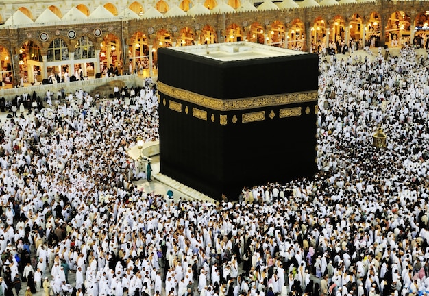 Premium Photo | Kaaba in mecca, muslim people praying together at holy ...