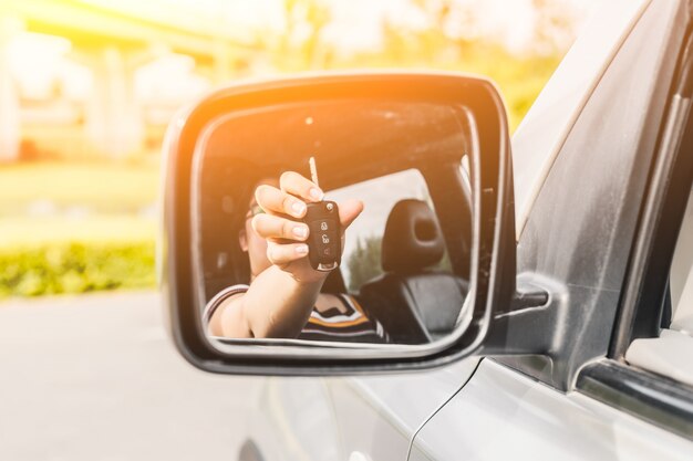 Key car reflected in rearview Free Photo