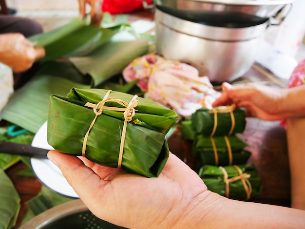 Premium Photo Khao Tom Mudbanana And Sticky Rice Wrap The Banana Leaves And Boil Or Steam 0573