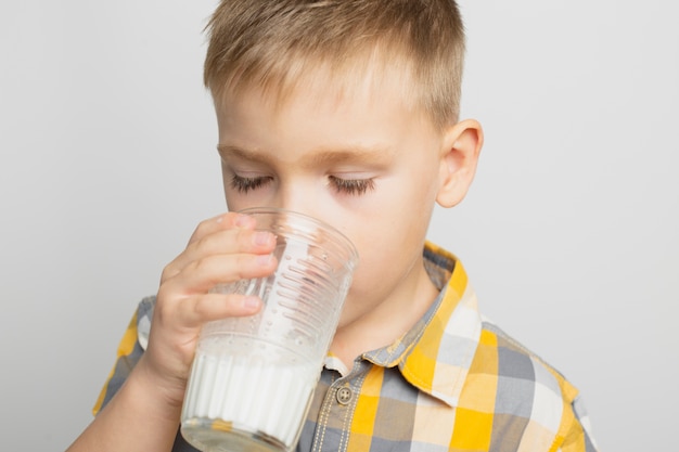 child drinking milk