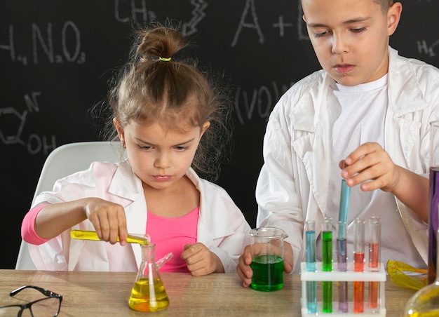 Free Photo | Kids in laboratory doing experiments