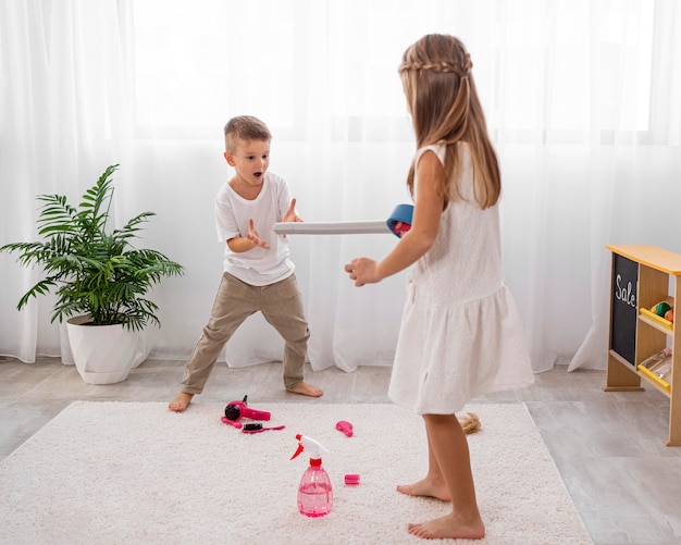 Free Photo | Kids playing with sword toys