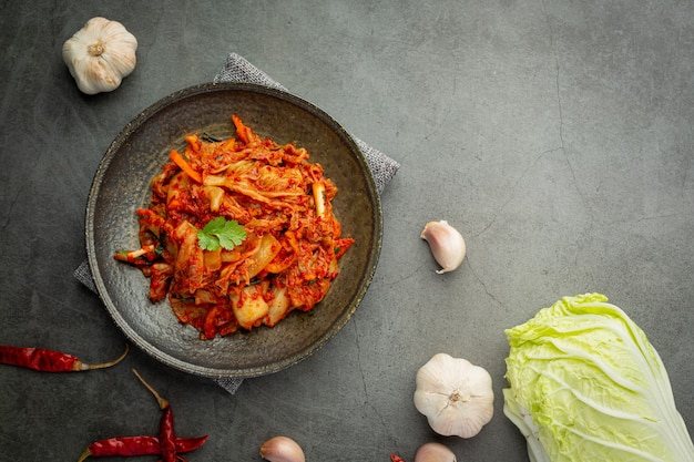 Free Photo | Kimchi ready to eat in black plate