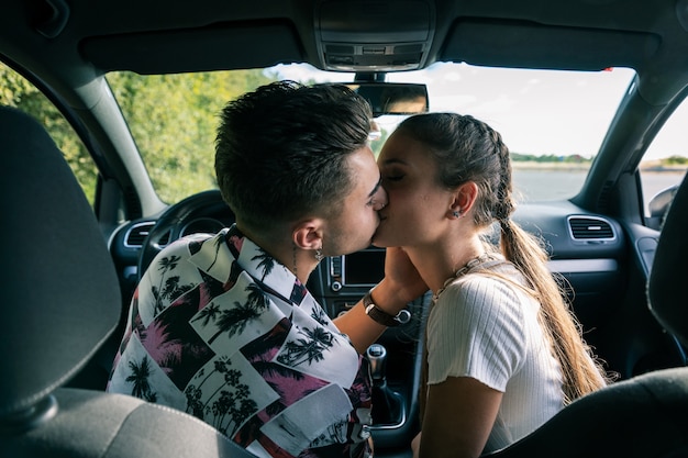 Premium Photo Kissing Couple On A Road Trip 