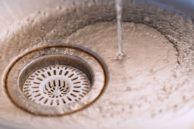 Premium Photo | Kitchen sink with water