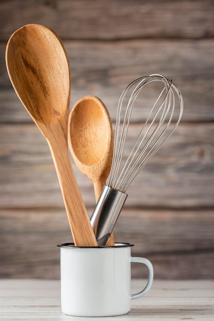 Premium Photo | Kitchen utensils on wooden background