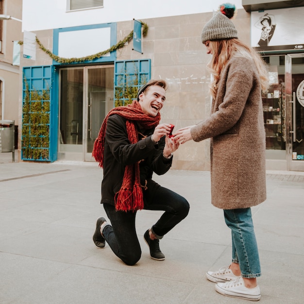 Free Photo | Kneeled man making proposal