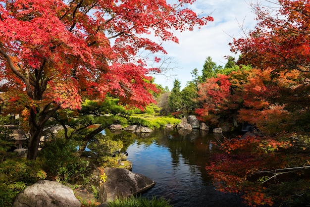 Premium Photo | Koko-en garden with fall foliage colors near the small ...