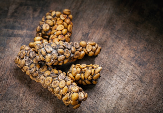 Premium Photo | Kopi luwak or civet coffee, coffee beans excreted by ...