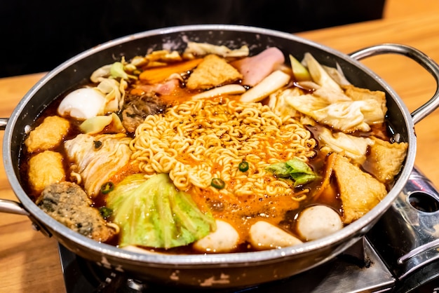 Premium Photo Korean Hot Pot Budae Jjigae Is Korean Fusion Food Incorporates American Style With Noodle Ham Sausages And Kimchi