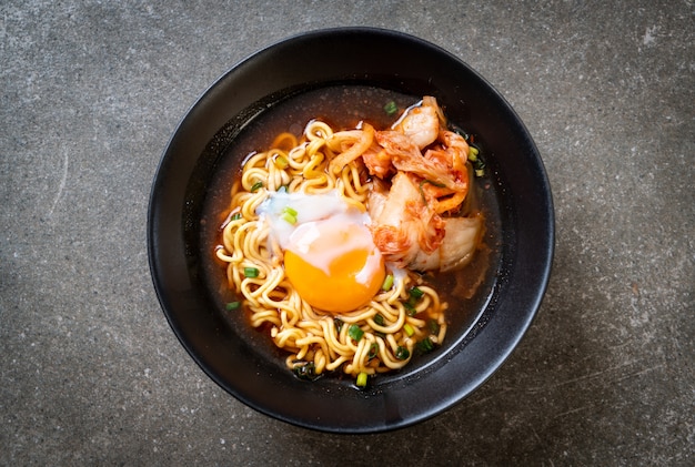 Korean instant noodles with kimchi and egg Premium Photo