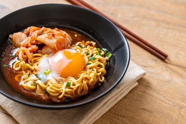 Premium Photo | Korean instant noodles with kimchi and egg