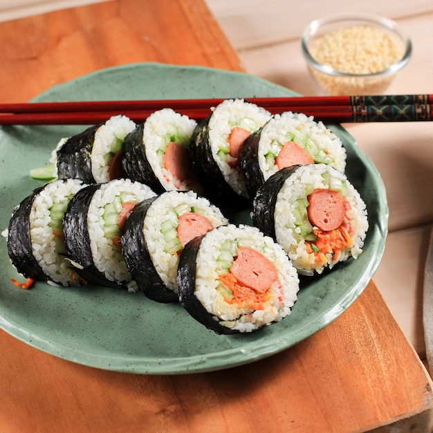 Premium Photo | Korean roll gimbap (kimbob or kimbap) made from steamed ...