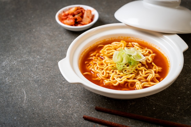 Premium Photo | Korean spicy instant noodles with kimchi