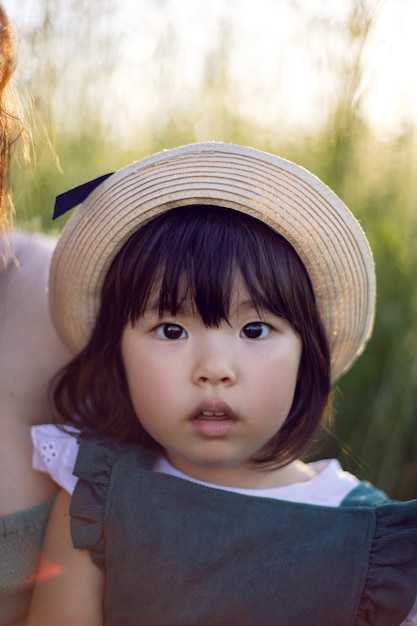 Premium Photo | Koreans Family Mother And Daughter In Green Dresses ...