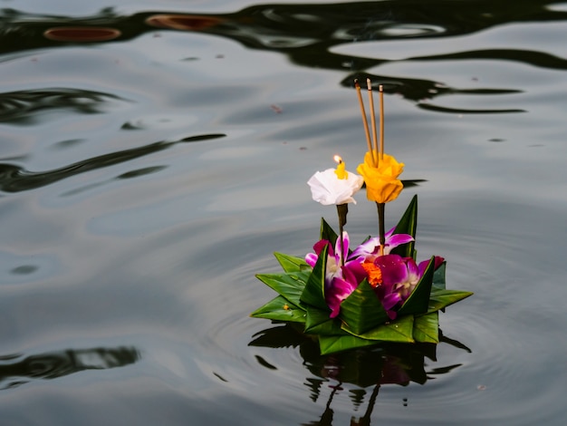 Premium Photo | Kratong floating on the river in loy krathong festival