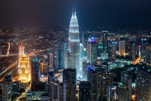 Premium Photo | Kuala lumpur city skyline and skyscraper at dusk in ...