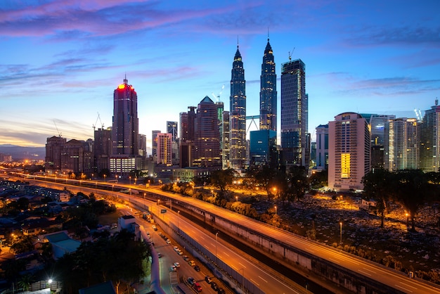 Premium Photo | Kuala lumpur city skyscraper and highway street with ...