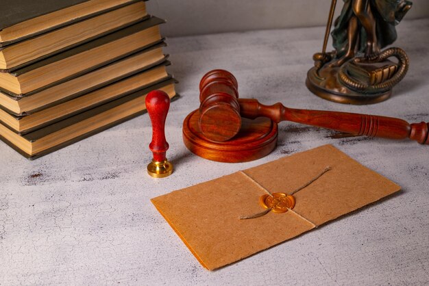 Premium Photo | Lady justice, judge's gavel, books, parchment scroll ...