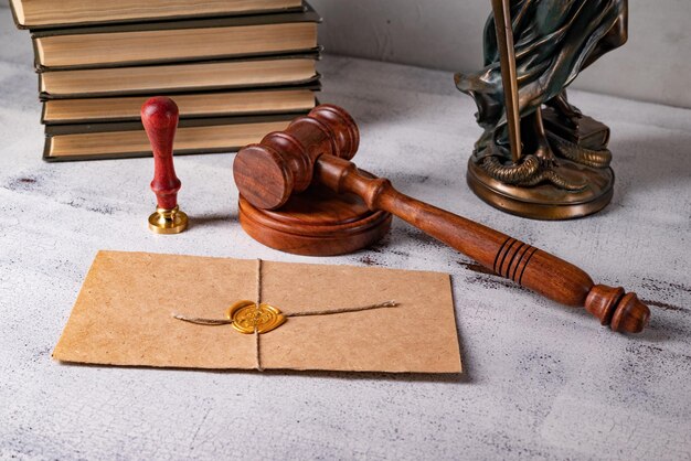 Premium Photo | Lady justice, judge's gavel, books, parchment scroll ...