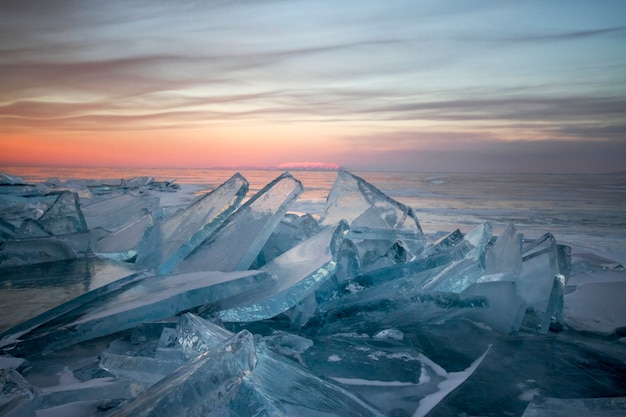 Premium Photo | Lake baikal at sunset, everything is covered with ice ...