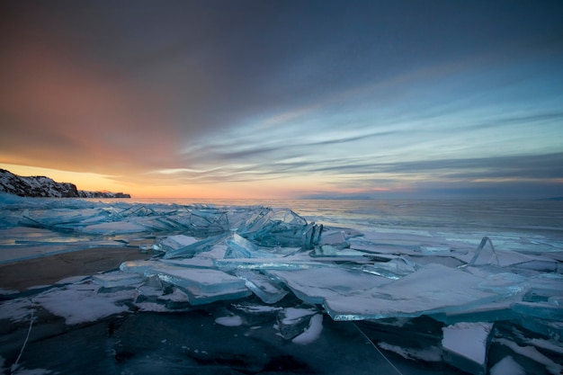 Premium Photo | Lake baikal at sunset, everything is covered with ice ...