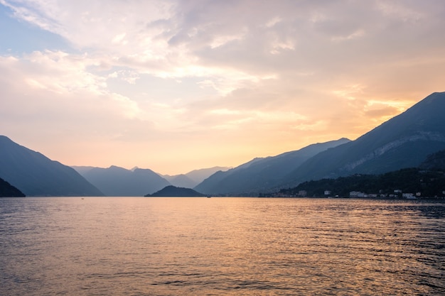 Lake como with mountains at sunset Photo | Premium Download