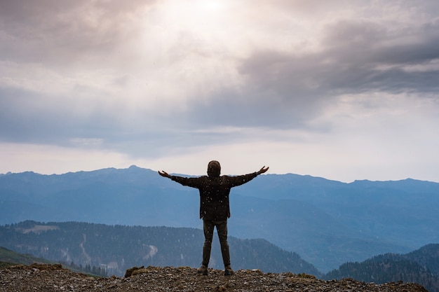 Premium Photo Landscape With Silhouette Of A Standing Happy Man And