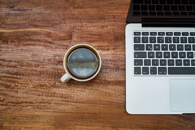 Premium Photo | Laptop with coffee