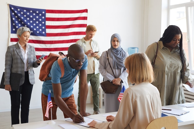 Premium Photo | Large multi-ethnic group of people registering at ...