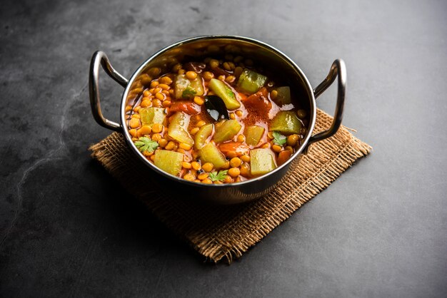 Premium Photo Lauki Or Doodhi Chana Dal Subji Or Bottlegourd Gram Curry Served In A Bowl