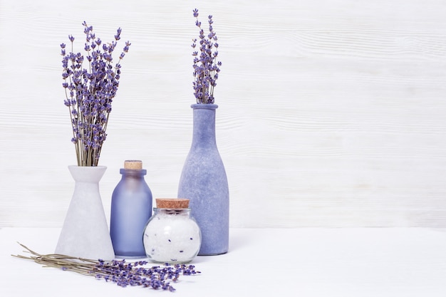 Lavender aromatherapy. spa background with dried lavender flowers and fragrant sea salt. copy space.