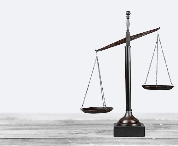 Premium Photo | Law scales on table background. symbol of justice