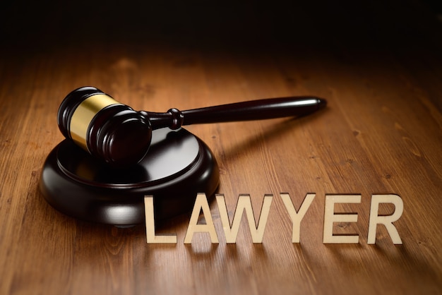 Premium Photo | Lawyer wooden letters