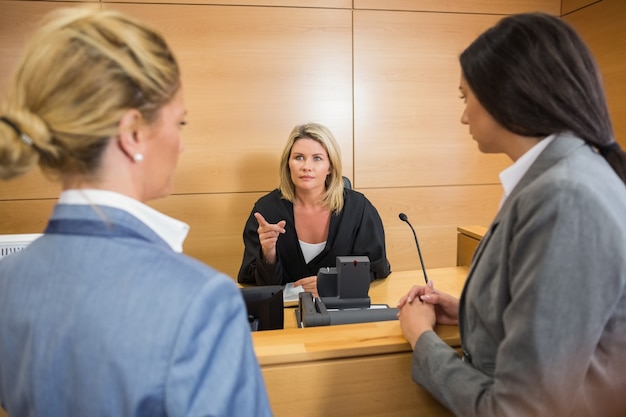 Premium Photo | Lawyers speaking with the judge