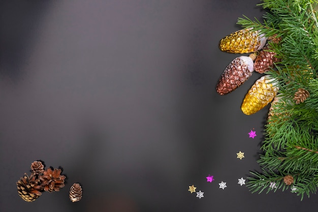 Christmas 2022 Themes Premium Photo | Layout On The Theme Of The New 2022 With Toys And Branches  Of A Christmas Tree On A Dark Background.