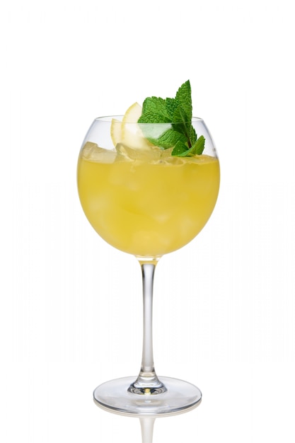 Lemon cocktail with a sparkling wine with ice cubes in wine glass isolated on white Premium Photo
