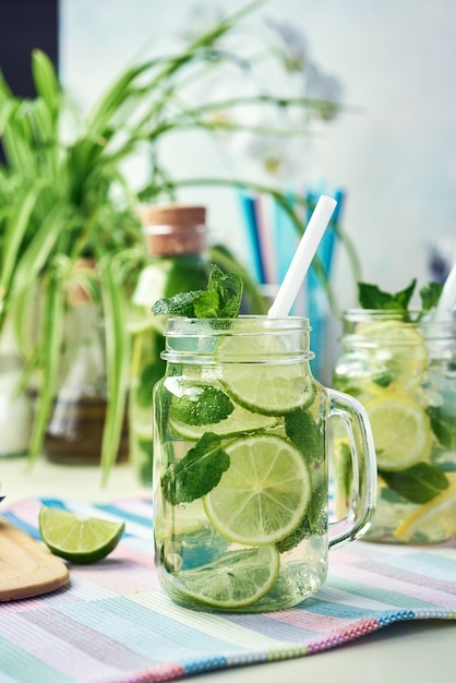 Premium Photo | Lemonade with lemon and lime