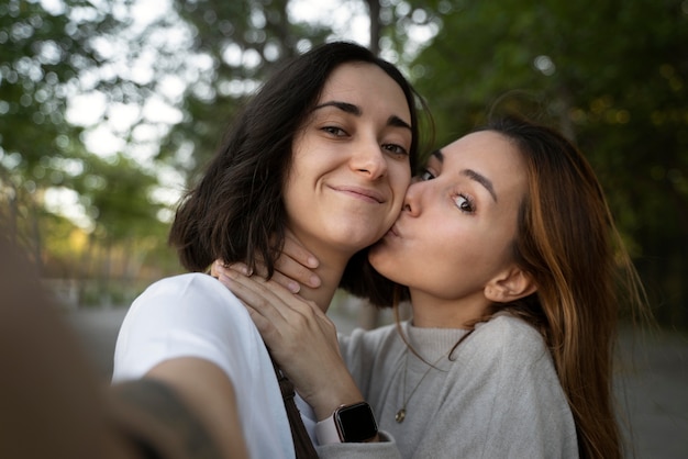 Free Photo Lesbian Couple Taking A Photo Together