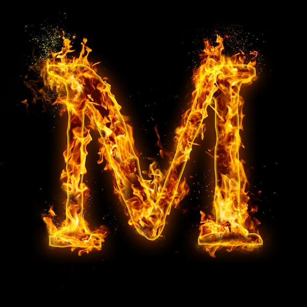 Premium Photo | Letter m. fire flames on black