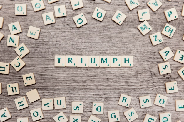 free-photo-letters-forming-the-word-triumph