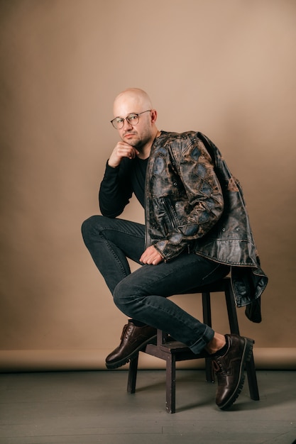 Premium Photo | Lifestyle portrait of fashionable stylish bald man in