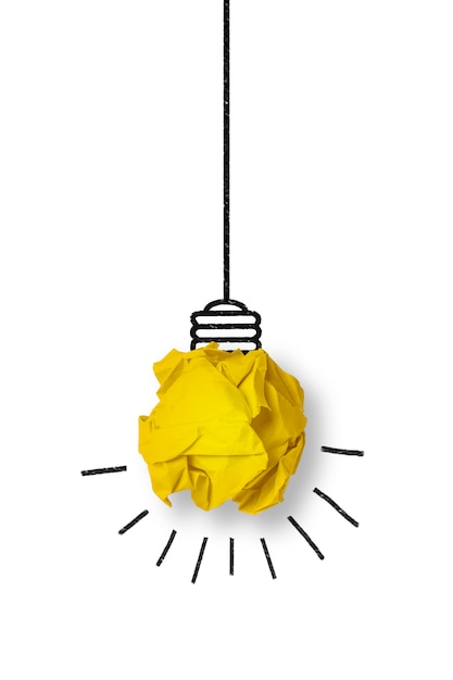 Free Photo | Light bulb made from a yellow paper ball