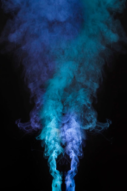 Premium Photo Light And Dark Blue Smoke Blowing Against Dark Background