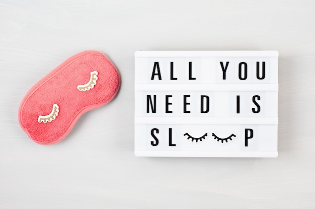 Lightbox with quote all you need is sleep Premium Photo