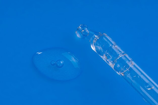 Liquid dropper with hyaluronic acid, peeling with bubbles Premium Photo