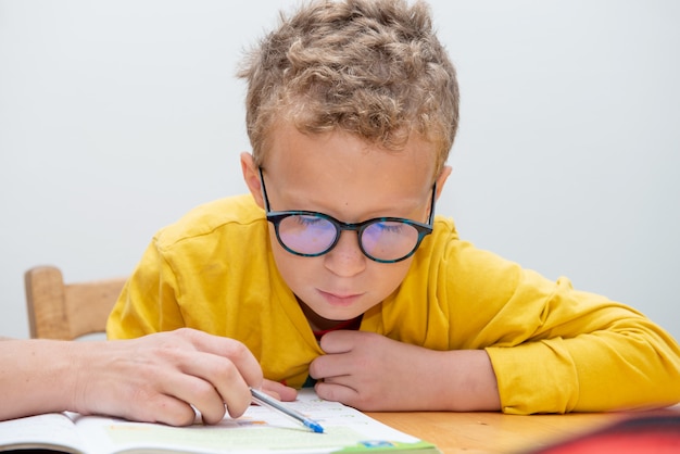 picture of a boy doing his homework