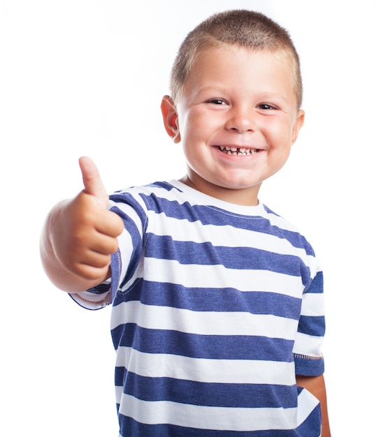 Free Photo Little Boy Smiling With A Thumbs Up