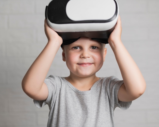 Free Photo | Little boy with virtual headset on