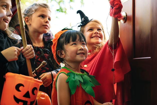 Free Photo | Little children trick or treating on halloween